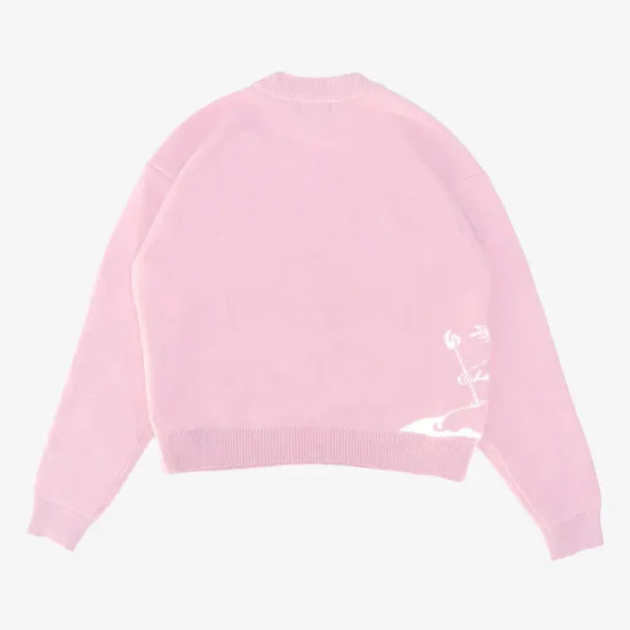 Pull Capucine rose, de dos
