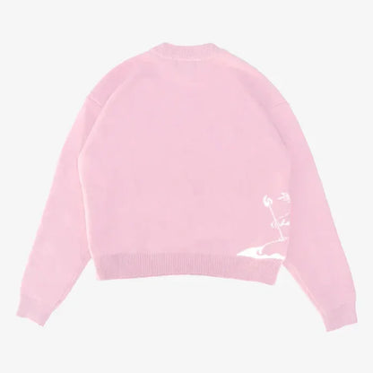 Pull Capucine rose, de dos